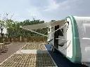 Roll Out Awning Side View 3.webp